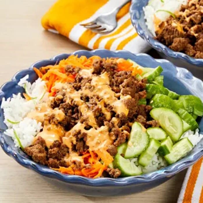 Beef Banh Mi Bowls with Sriracha Mayo, Carrot & Pickled Cucumber, a Vietnamese dish
